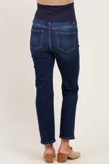 woman wearing dark blue maternity jeans with a supportive waistband, viewed from the back