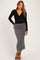 woman wearing a black long sleeve wrap top and a grey ribbed maternity maxi skirt