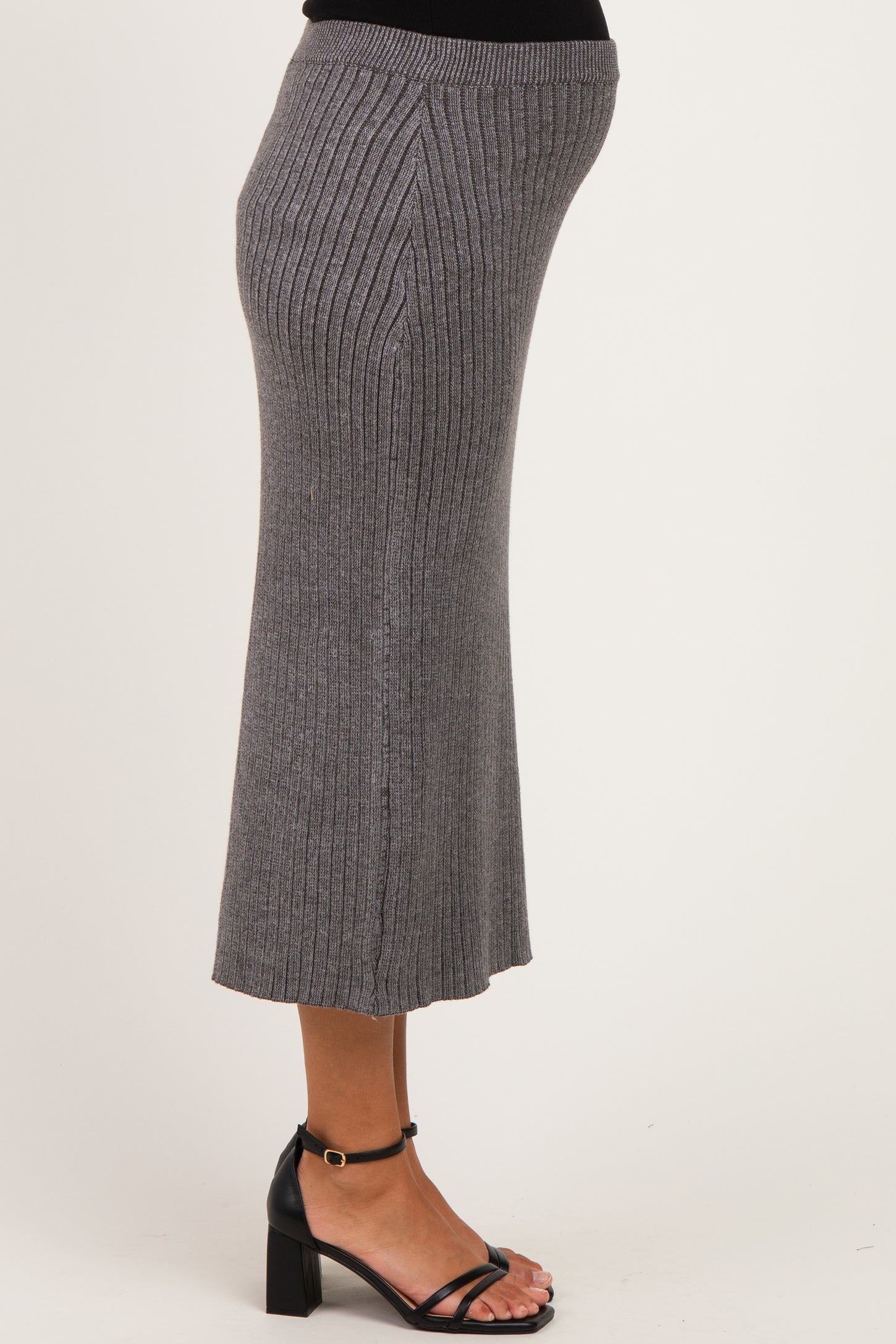 maternity wear grey ribbed knit midi skirt with a fitted waistband, model showing a visible baby bump