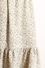 floral print midi dress in cream with ruffled hem and gathered detailing