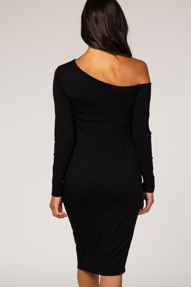 woman wearing a black long sleeve off-the-shoulder bodycon dress from the back
