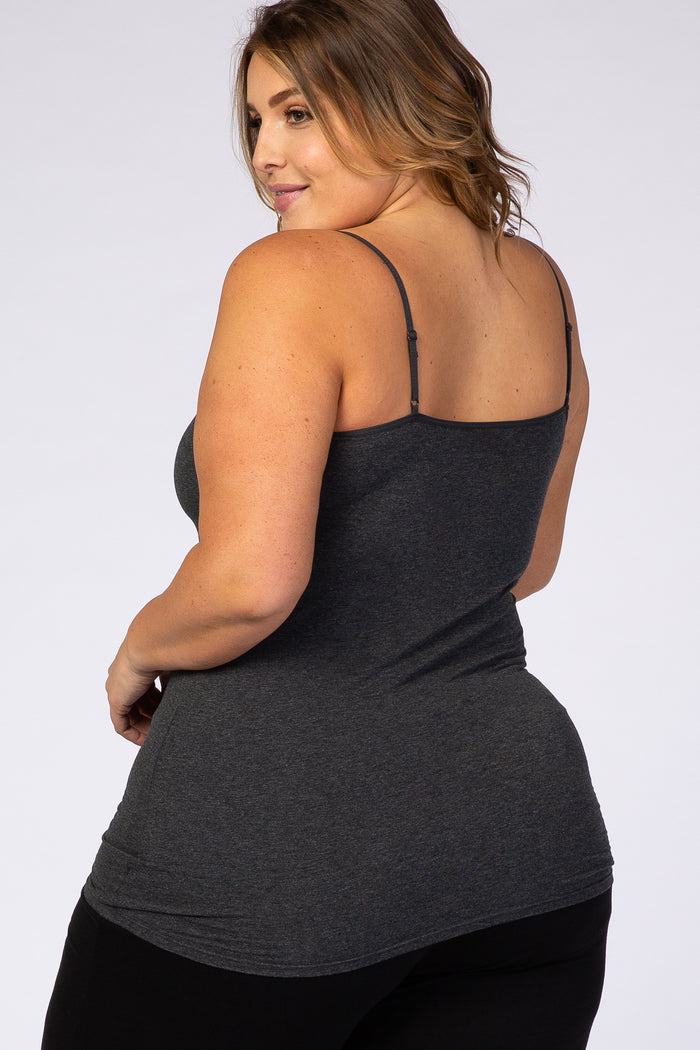 woman wearing a dark gray plus size camisole with thin straps, looking over her shoulder