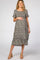 woman wearing a black floral maternity midi dress with ruffle sleeves and a visible baby bump