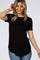 woman wearing a black short sleeve ribbed maternity top and blue jeans