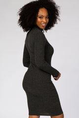 woman wearing a charcoal gray long sleeve bodycon dress with a high neckline and a fitted silhouette