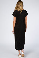 woman wearing a black maternity maxi dress with short sleeves and a relaxed fit, shown from the back