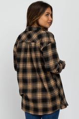 woman wearing a brown and black plaid maternity flannel shirt with a relaxed fit, showing the back view