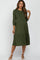 woman wearing olive green ribbed maternity midi dress with tiered skirt and three-quarter sleeves