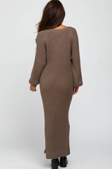 woman from behind wearing a long brown ribbed knit maxi dress with long sleeves