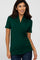 woman wearing a dark green short sleeve crossover top paired with blue jeans