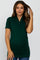 woman wearing a dark green short sleeve maternity top and showing her baby bump