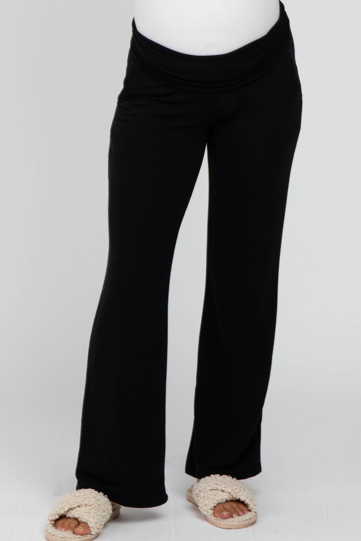 maternity wear black flared pants with a foldover waistband, model not visible