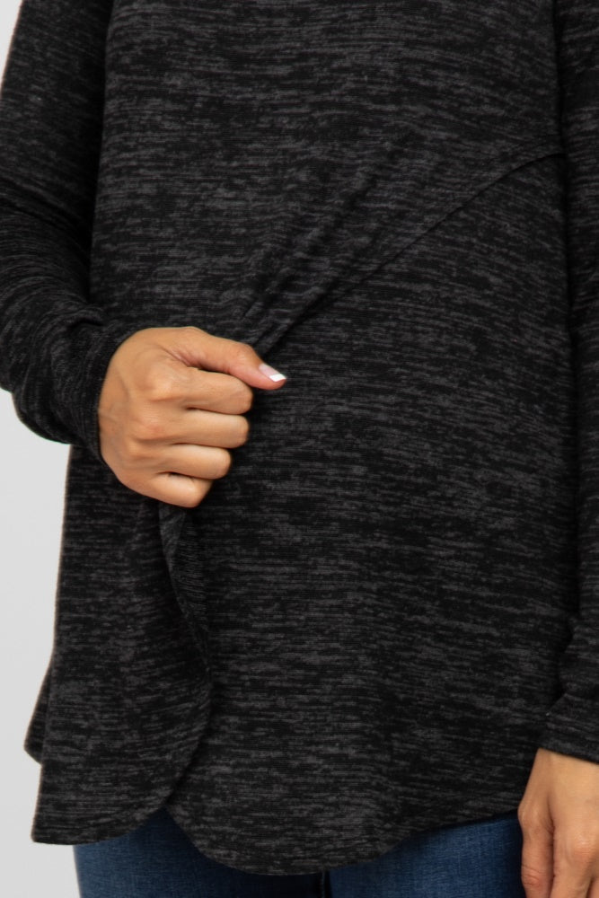 Close up of a person wearing a charcoal grey marl nursing top with a crossover front design for breastfeeding