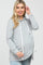 woman wearing a gray maternity hoodie with a drawstring and a visible baby bump