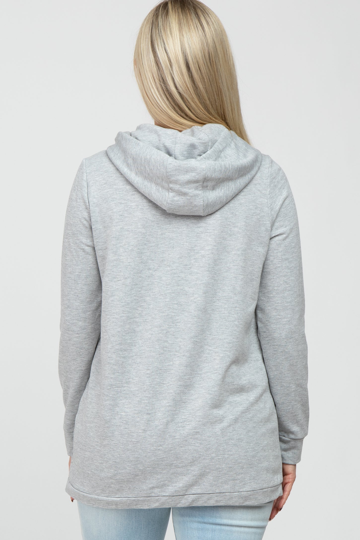 woman wearing a gray maternity hoodie with a hood and long sleeves, viewed from the back