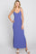 woman wearing a ribbed purple maxi dress with side slits and spaghetti straps