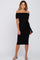 woman wearing a black off-the-shoulder fitted dress with a belted waist and a midi length, standing confidently