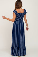 woman wearing a navy blue striped maxi dress with ruffle sleeves and smocked bodice, shown from the back