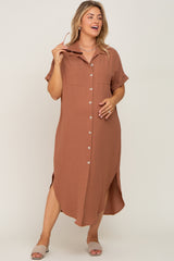 woman wearing a brown short sleeve button down midi dress with side slits and tan sandals