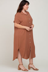 plus size woman wearing a rust brown short sleeve button down midi shirt dress with side slits and tan heels