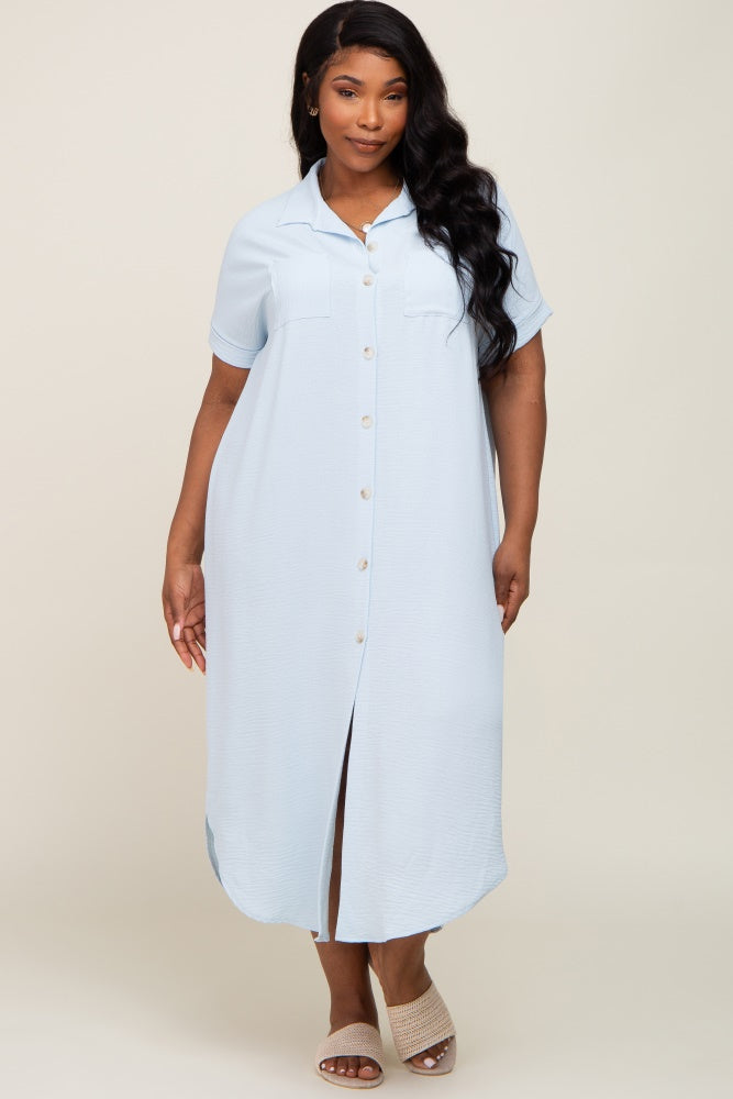 woman wearing a light blue short sleeve button down midi dress with collar and front pockets