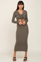 woman wearing olive green ribbed knit two piece set with long sleeve crop top and matching midi skirt
