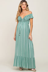 woman wearing a green striped off-the-shoulder maternity maxi dress with a baby bump and tiered bottom