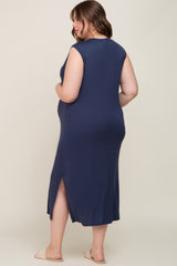 woman wearing a navy blue sleeveless maternity dress with a side slit and showing her baby bump from the back