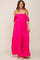 woman wearing a hot pink off-the-shoulder smocked maternity maxi dress with tiered skirt