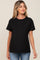 woman wearing a black maternity t-shirt with short sleeves and a relaxed fit, showing her baby bump