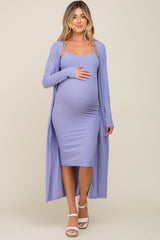 woman wearing a lavender ribbed maternity dress with a long matching cardigan, highlighting her baby bump
