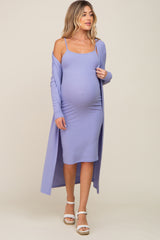 woman wearing a lavender ribbed maternity dress with spaghetti straps and a long cardigan, showing her baby bump