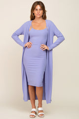woman wearing a lavender ribbed dress with a matching long cardigan and white sandals