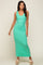woman wearing a mint green ribbed sleeveless maxi dress and platform sandals