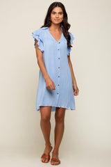 woman wearing a light blue button down mini dress with ruffle sleeves and frayed hem
