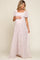 pregnant woman in light pink floral maternity maxi dress with smocked bodice and flutter sleeves