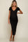 woman wearing a black short sleeve maternity dress with a deep v-neck and a fitted style, showcasing her baby bump