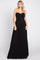 woman wearing a black strapless evening gown with a fitted bodice and flowing skirt