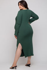 woman wearing a dark green ribbed long sleeve maternity dress with a side slit, showcasing her baby bump