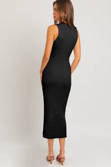 woman wearing a black ribbed sleeveless midi dress, showcasing a form-fitting silhouette from the back