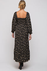 maternity wear black floral maxi dress with long sleeves and square back, model shown from behind