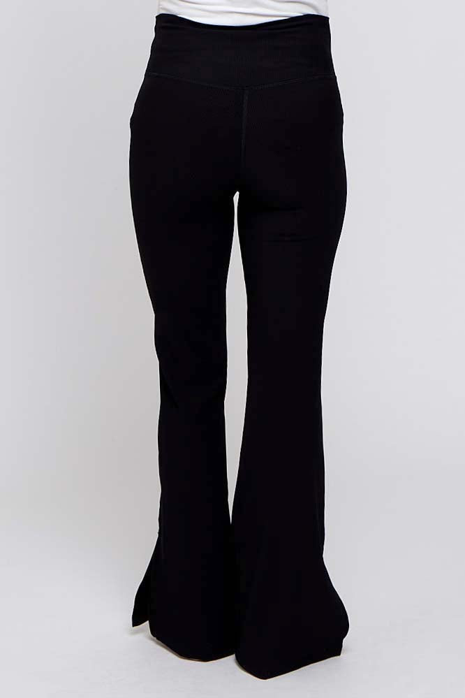 maternity wear black flared pants with a high waistband viewed from the back