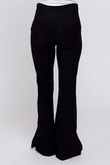 maternity wear black flared pants with a high waistband viewed from the back