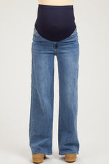 maternity wear blue wide leg jeans with a dark navy belly panel and no visible baby bump