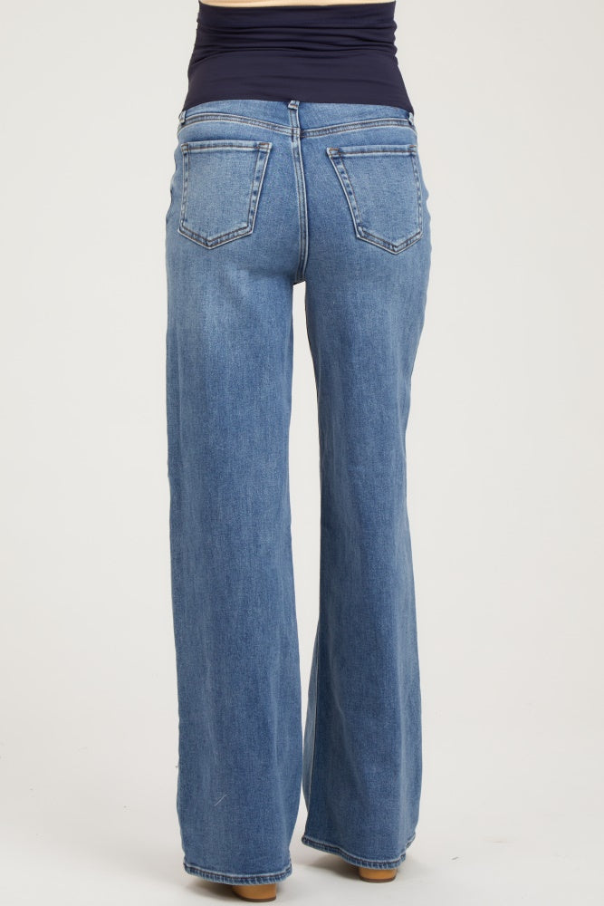 woman wearing light blue maternity wide-leg jeans, showing the back view