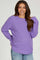 woman wearing a lavender knit maternity sweater with a relaxed fit and long sleeves
