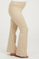 maternity wear beige flare pants with a stretchy waistband and visible baby bump