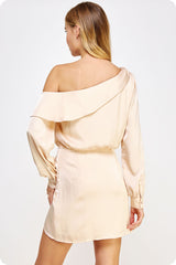woman wearing a light peach off-the-shoulder mini dress with long sleeves and ruching detail on the side