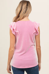 woman wearing a pink and white striped maternity top with ruffled sleeves from the back