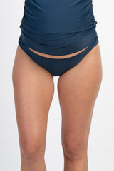 maternity swim bottoms in navy blue with ruched detailing and a low-rise fit